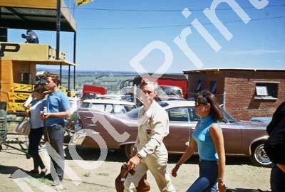 1967 SA GP Mike Spence and wife note car in background (thanks Vito Momo via G Cavalieri) 026