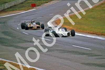 (thanks Stuart Falconer) a 734 1980 SA GP Reutemann FW07B; Mass Arrows A3 note dirty helmet